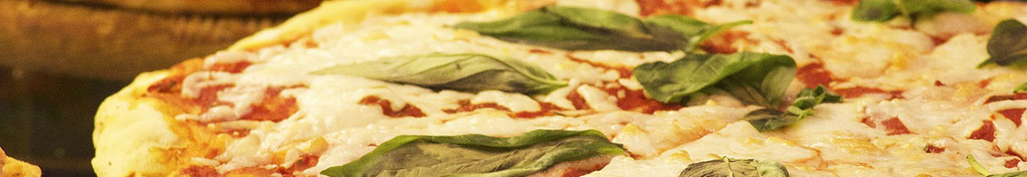 Eating Italian Pizza at Taste Of Italy restaurant in Woodstock, GA.